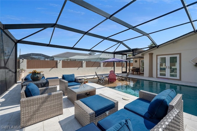 view of swimming pool with french doors, an outdoor living space, glass enclosure, and a patio area