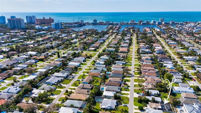 birds eye view of property featuring a water view