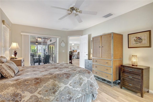 bedroom featuring access to exterior, ceiling fan, and light hardwood / wood-style floors