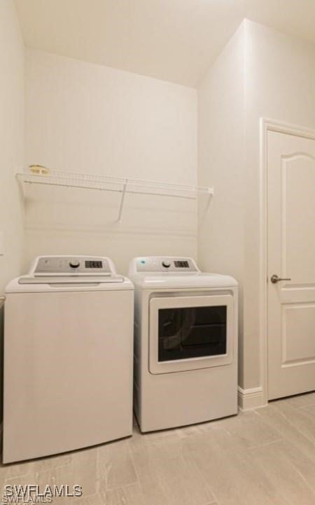 laundry room featuring washer and dryer