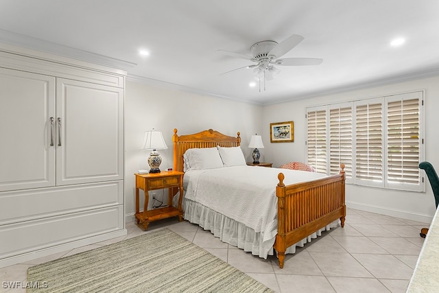 bedroom featuring ceiling fan, light tile patterned floors, and ornamental molding