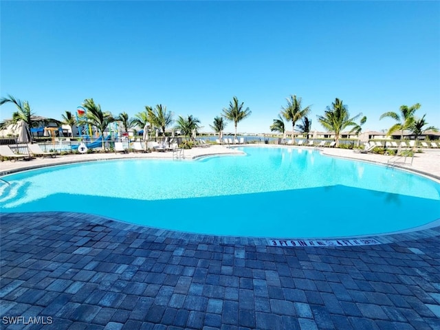 view of pool with a patio area