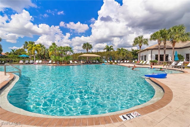 view of pool featuring a patio area