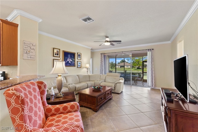 tiled living room featuring ceiling fan and crown molding