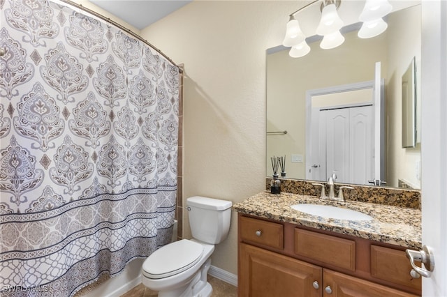 full bathroom featuring shower / bath combination with curtain, vanity, and toilet