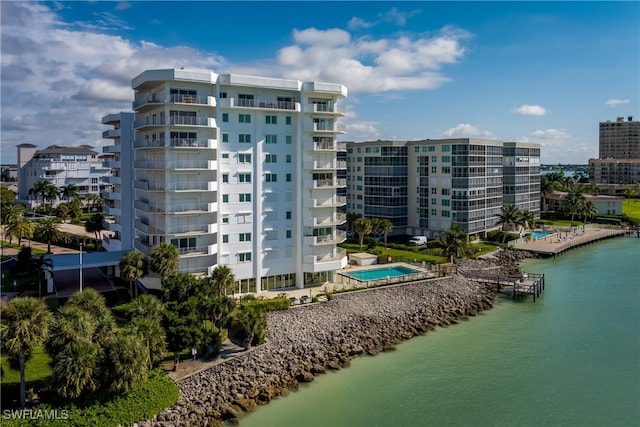 view of building exterior with a water view