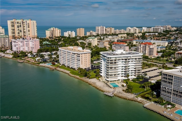 birds eye view of property featuring a water view