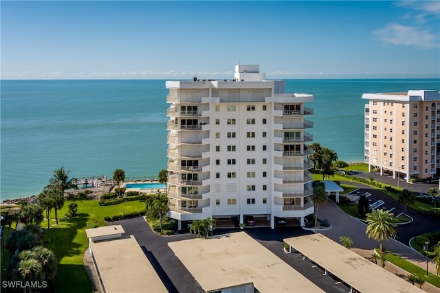 birds eye view of property featuring a water view