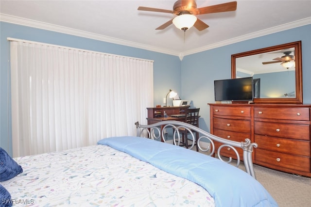 carpeted bedroom featuring crown molding and a ceiling fan