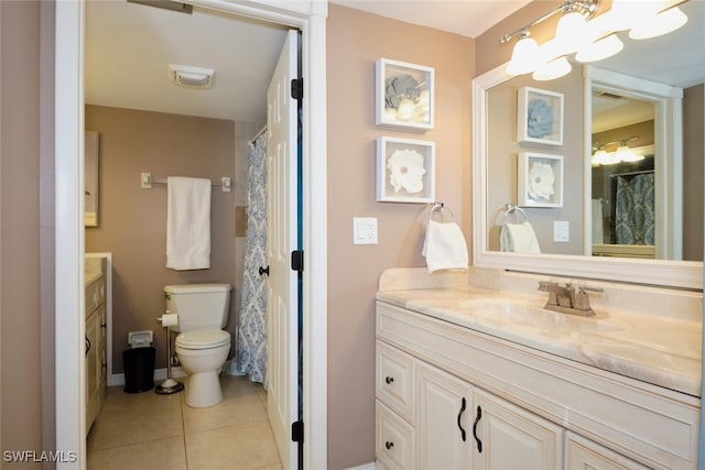 full bathroom featuring tile patterned floors, vanity, toilet, and visible vents