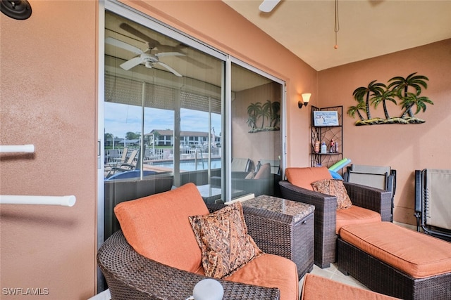 balcony featuring ceiling fan
