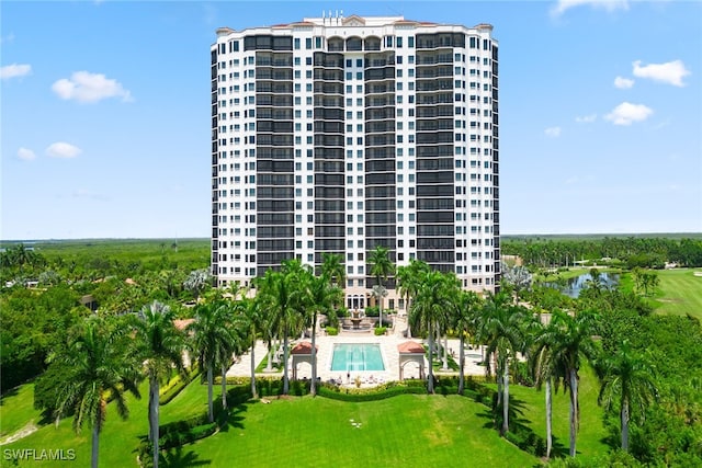 view of property featuring a swimming pool