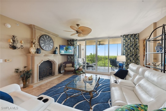 tiled living room featuring ceiling fan