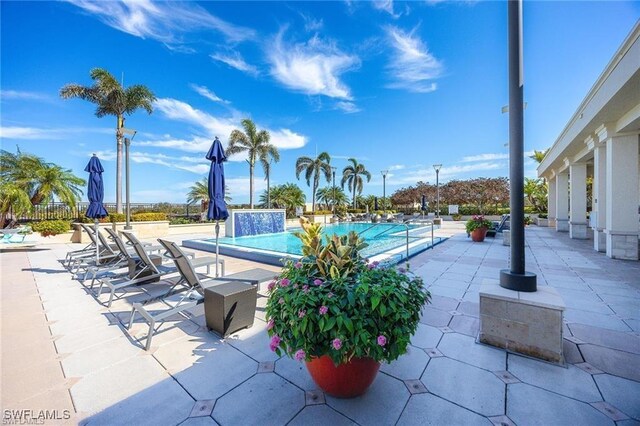 view of pool featuring a patio