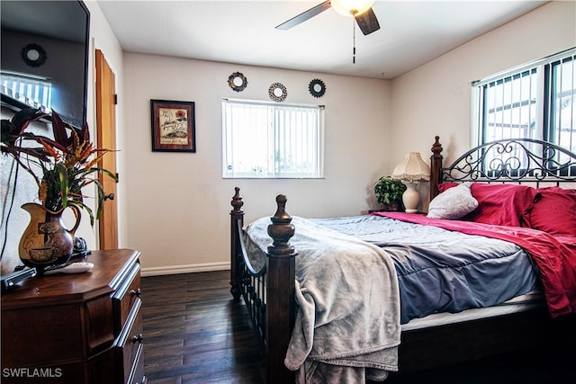 bedroom featuring dark hardwood / wood-style floors and ceiling fan