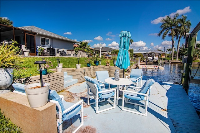 view of patio / terrace with a water view