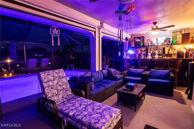 view of patio / terrace featuring outdoor lounge area and ceiling fan