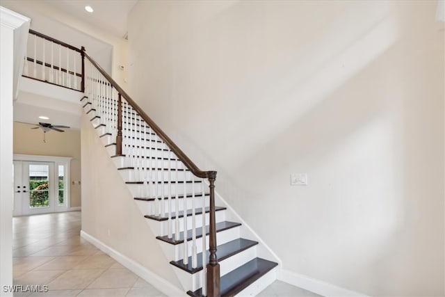 15621 Red Fox Run, Fort Myers, FL 33912 - staircase featuring tile patterned floors, a ceiling fan, recessed lighting, and a high ceiling