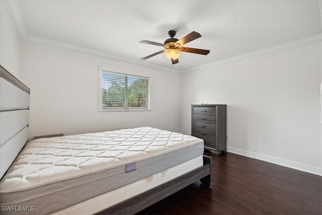 bedroom featuring crown molding, ceiling fan, and dark hardwood / wood-style flooring