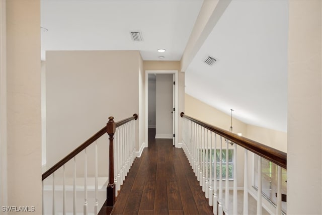 hall with dark wood-type flooring