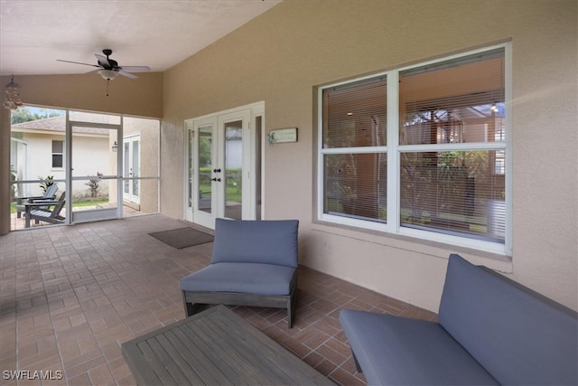 view of patio featuring french doors and ceiling fan