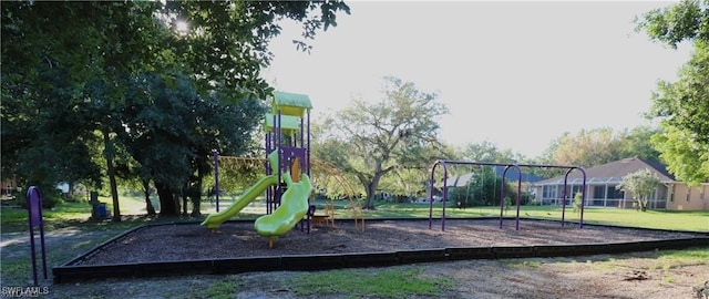 view of playground featuring a yard