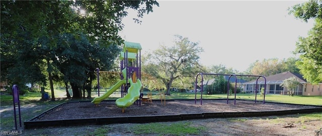 15621 Red Fox Run, Fort Myers, FL 33912 - communal playground featuring a yard