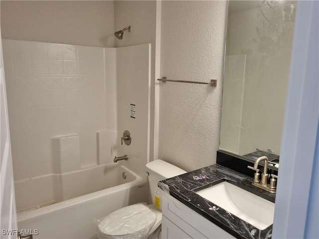 full bathroom with toilet, vanity, and shower / bathing tub combination