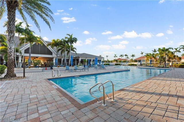 12917 Hadley Ct, Fort Myers, FL 33913 - community pool with a patio area