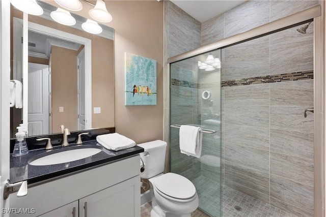 12917 Hadley Ct, Fort Myers, FL 33913 - bathroom with vanity, toilet, and a shower stall