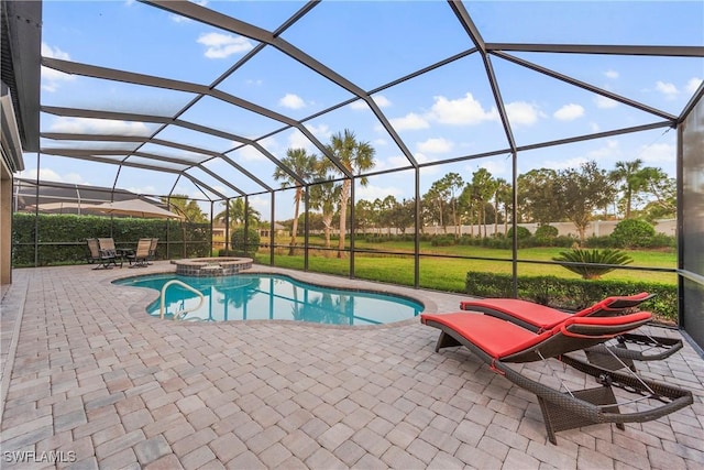 12917 Hadley Ct, Fort Myers, FL 33913 - view of swimming pool featuring a patio area, a pool with connected hot tub, and glass enclosure