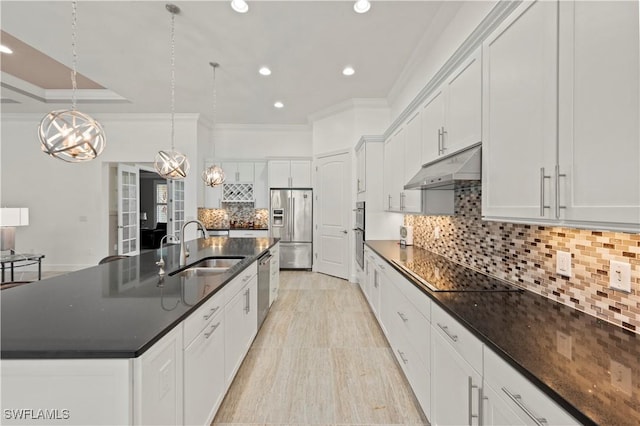 12917 Hadley Ct, Fort Myers, FL 33913 - kitchen featuring stainless steel appliances, under cabinet range hood, a sink, backsplash, and crown molding