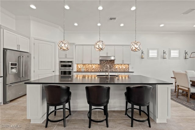 12917 Hadley Ct, Fort Myers, FL 33913 - kitchen featuring stainless steel appliances, a sink, ornamental molding, dark countertops, and tasteful backsplash