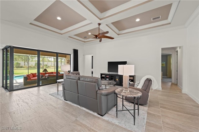 12917 Hadley Ct, Fort Myers, FL 33913 - living room featuring crown molding, ceiling fan, coffered ceiling, a high ceiling, and baseboards