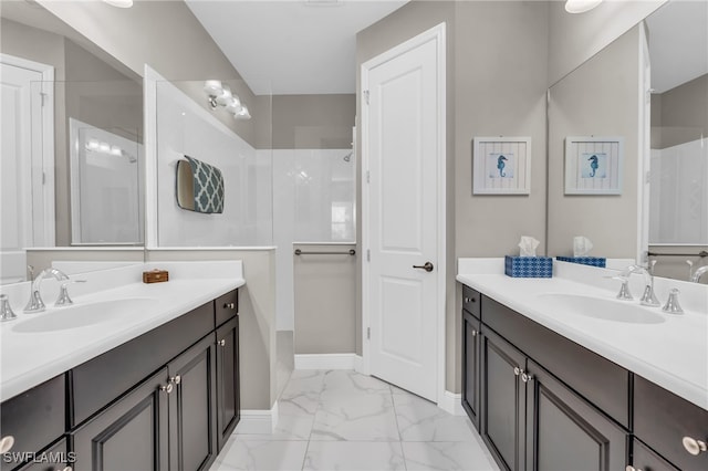 bathroom with a shower and vanity