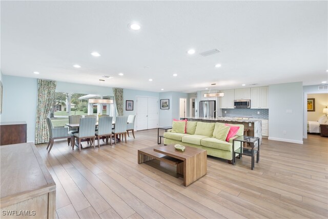 living room featuring light wood-type flooring