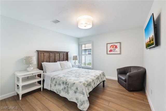 bedroom featuring light wood-type flooring