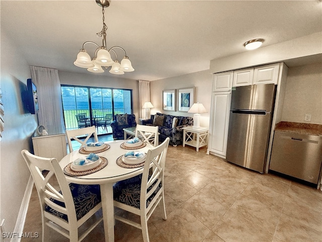 dining area with a chandelier