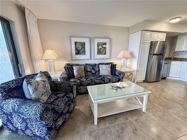 tiled living room featuring sink