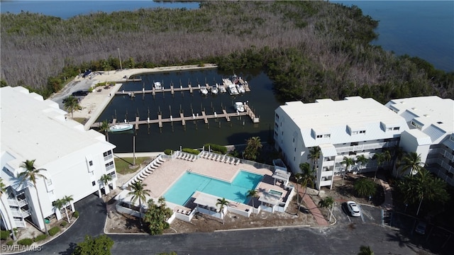 birds eye view of property featuring a water view