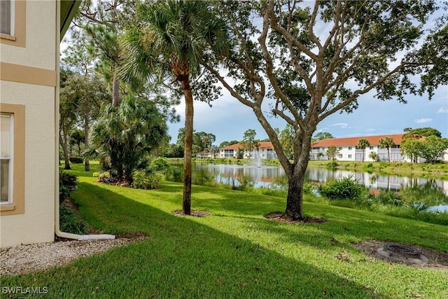 view of yard featuring a water view