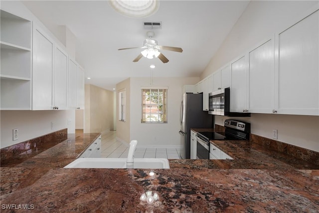 kitchen featuring appliances with stainless steel finishes, kitchen peninsula, ceiling fan, sink, and white cabinetry