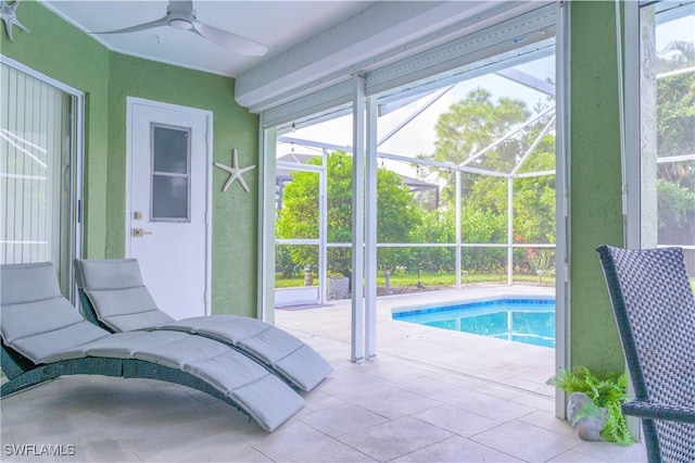 view of swimming pool with ceiling fan