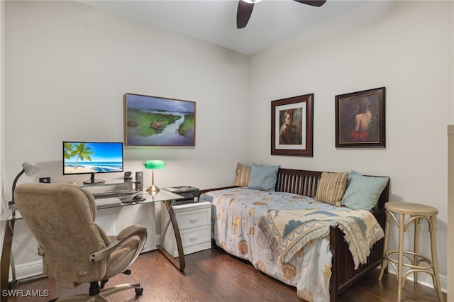 bedroom featuring ceiling fan and dark hardwood / wood-style flooring