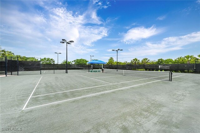 7638 Jacaranda Ln, Naples, FL 34114 - view of sport court featuring fence