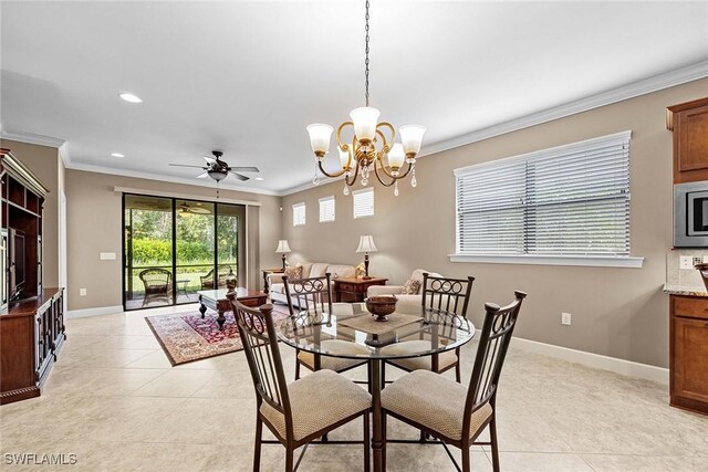 7638 Jacaranda Ln, Naples, FL 34114 - dining area with ceiling fan with notable chandelier, crown molding, and light tile patterned floors