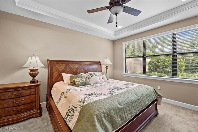 7638 Jacaranda Ln, Naples, FL 34114 - carpeted bedroom with baseboards, multiple windows, ceiling fan, and ornamental molding