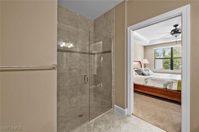 7638 Jacaranda Ln, Naples, FL 34114 - ensuite bathroom with a raised ceiling, a shower stall, ensuite bath, baseboards, and ceiling fan