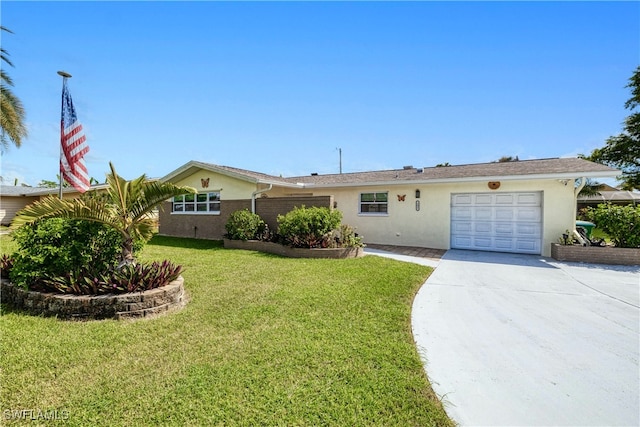 ranch-style house featuring a front yard and a garage