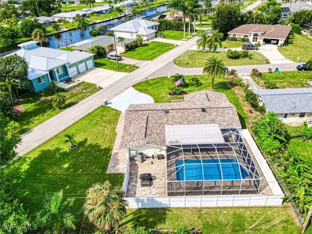 drone / aerial view featuring a water view